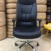 PU Leather Office Seat in a modern workspace setting, showcasing its ergonomic design and adjustable height.