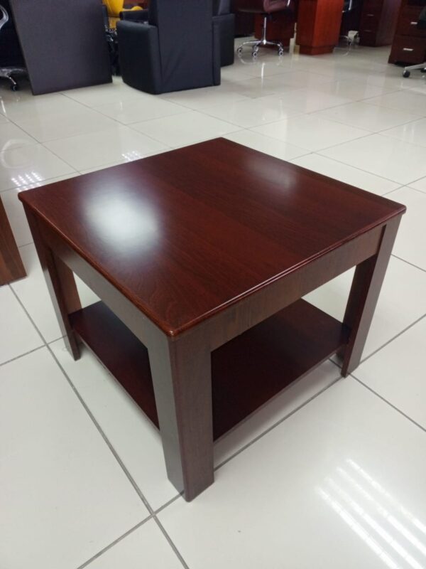 Wooden office home coffee table with natural grain, minimalist design, and a lower shelf for storage.