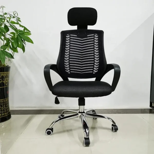 An ergonomic office chair with a headrest, adjustable features, and a sleek design, placed in a modern office setting.