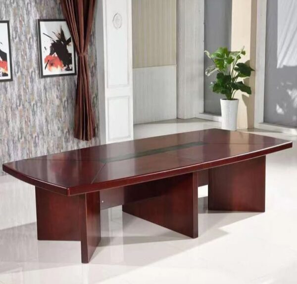 Boardroom Table in a modern office setting, showcasing its sleek design and spacious surface.