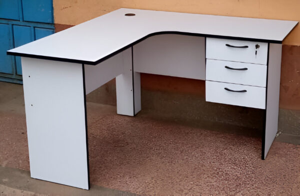 1200mm Wooden Curved Office Desk with a sleek design, spacious surface, and integrated cable management, set in a modern office environment.