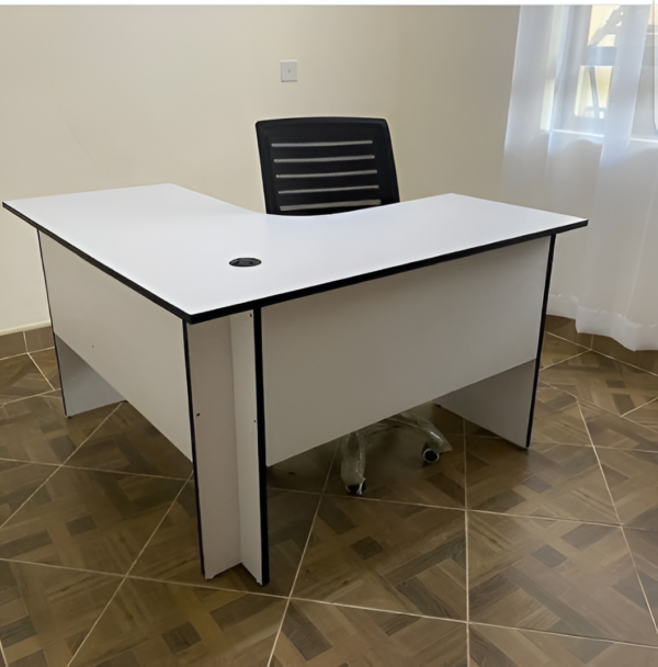 1200mm Wooden Curved Office Desk with a sleek design, spacious surface, and integrated cable management, set in a modern office environment.