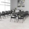 Black Conference Chair with mesh backrest and padded faux leather seat.