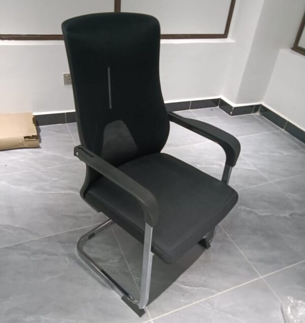 Ergonomic orthopedic study desk chair with adjustable lumbar support and breathable upholstery.