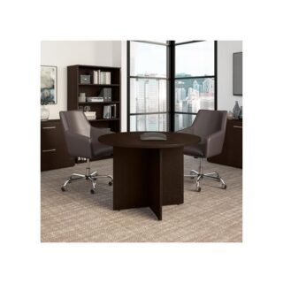 1200mm Round Boardroom Wooden Table with a polished finish, set in a modern conference room, surrounded by chairs.