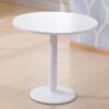 Modern round coffee/tea table featuring a sleek design and stylish finish.