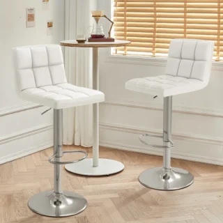 White Leather Adjustable Barstool with a sleek chrome base, showcasing its elegant design in a contemporary kitchen setting.