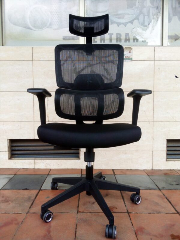 High-back Mesh Orthopedic Office Seat showcasing its ergonomic design and breathable mesh back in a modern office setting.