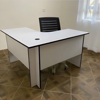 1200mm Wooden Curved Office Desk with a sleek design, spacious surface, and integrated cable management, set in a modern office environment.