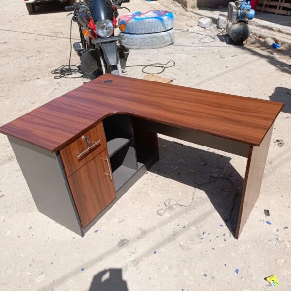 1.4 Meters Teak Wood Study Desk showcasing natural grain and spacious surface.