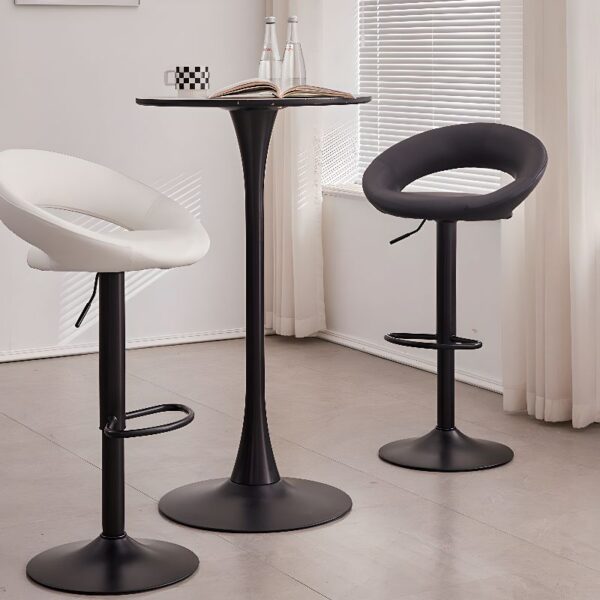 Height Adjustable Swivel Leather Barstool in a stylish kitchen setting, showcasing its sleek design and comfortable seating.