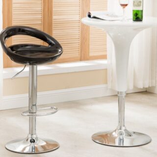 Metal Base Swivel Bar Stool in a modern kitchen, showcasing its sleek design and comfortable padded seat.