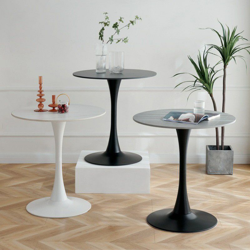 Alt Text: "Round Dining Table with a sleek design, perfect for family meals and gatherings.