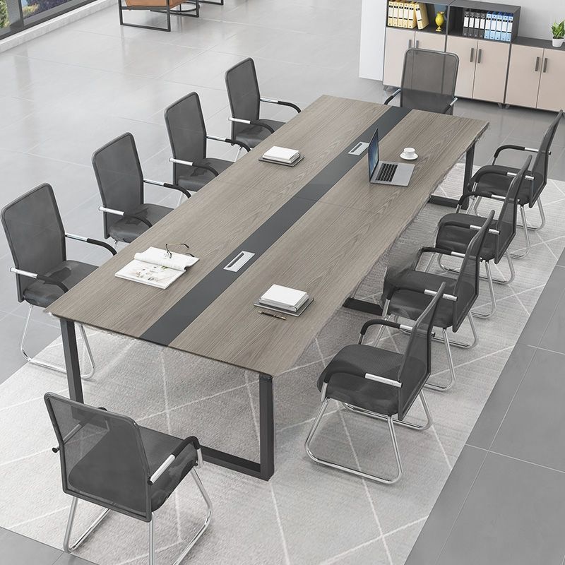 Large conference table for 8-10 people with a sleek design, perfect for professional meetings and collaborative discussions.