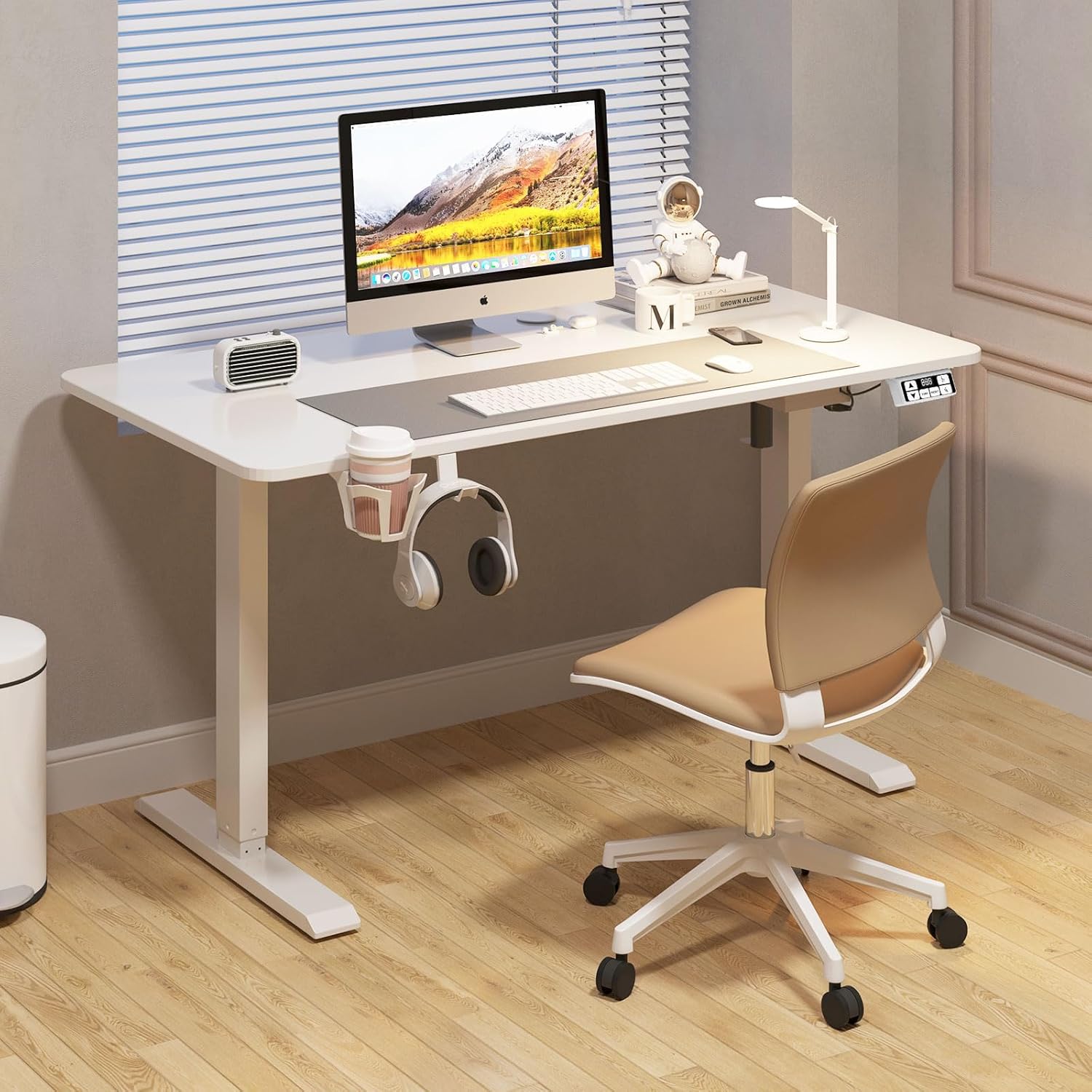 "Sleek modern adjustable height desk with ergonomic design and clean lines."