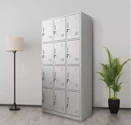 12-Locker Steel Office Cabinet with individual locking compartments for secure storage.