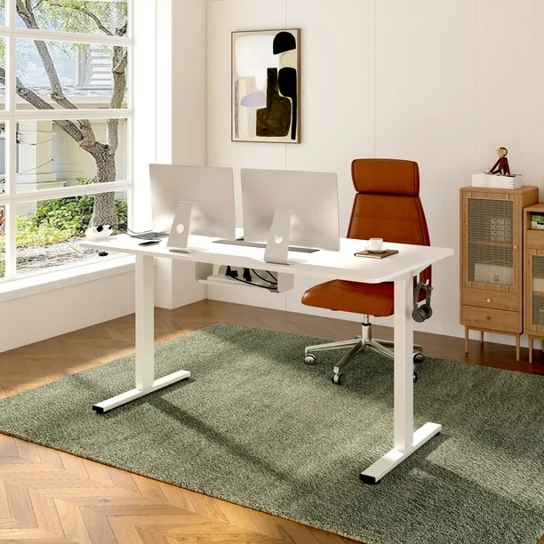 "Electric sit and stand desk with adjustable height for ergonomic office use"