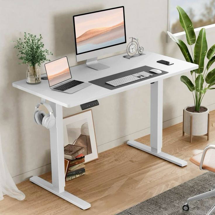 "White modern height adjustable electric desk with memory presets and smooth lift system."