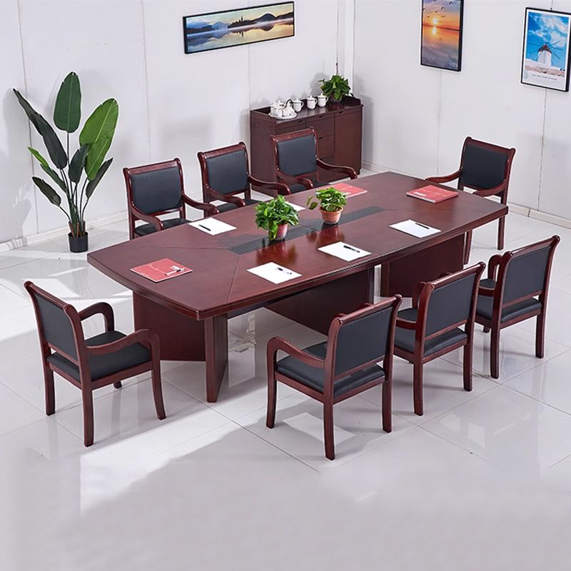 "Brown executive boardroom table with a polished wood finish, designed for professional office spaces."