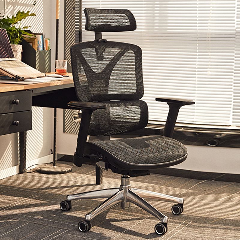 Black High-Back Executive Office Chair with adjustable headrest, padded armrests, and ergonomic support for comfortable and stylish office seating