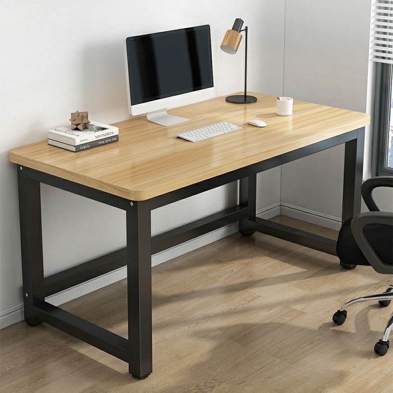 "Black-frame office computer table with spacious tabletop and sturdy steel frame, ideal for work and study."