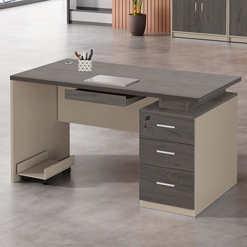 Rectangular desk with locking drawers offering secure storage and a spacious work surface for home or office use.