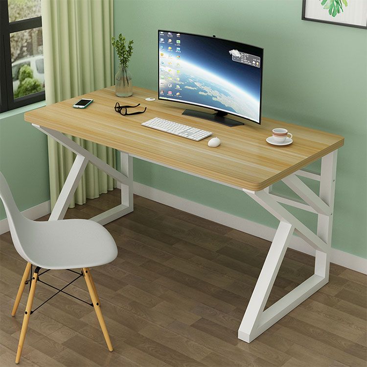 Modern computer writing desk with a spacious tabletop, built-in storage, and a sleek metal frame, perfect for home and office use.