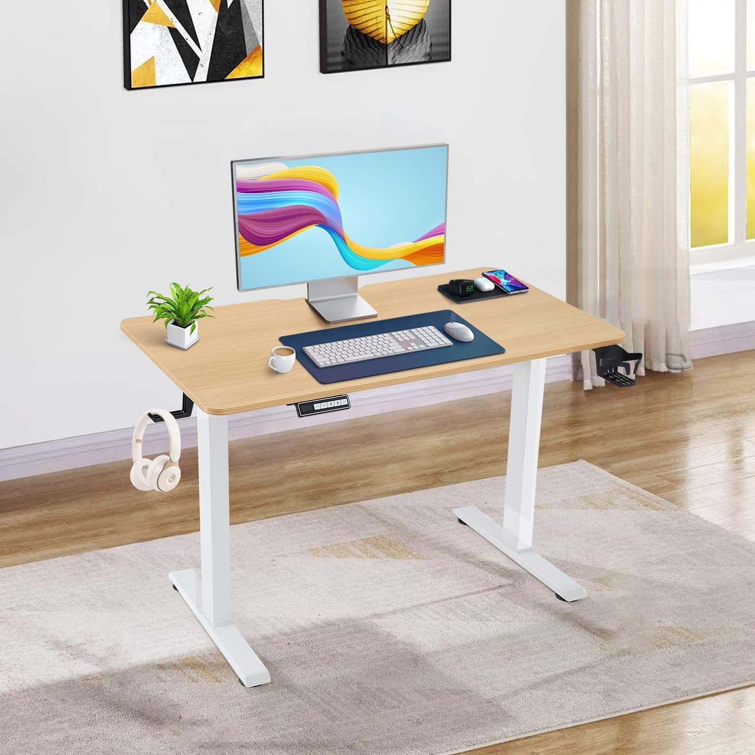 "Portable electric height adjustable office desk with a sleek design, spacious tabletop, and ergonomic features for sitting or standing."