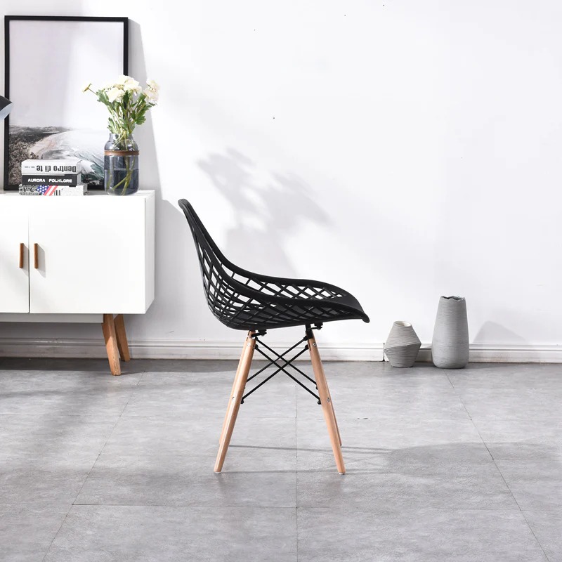 "Generic Strong Mesh Eames Chair with ergonomic design, breathable mesh backrest, and cushioned seat in a modern office setting."