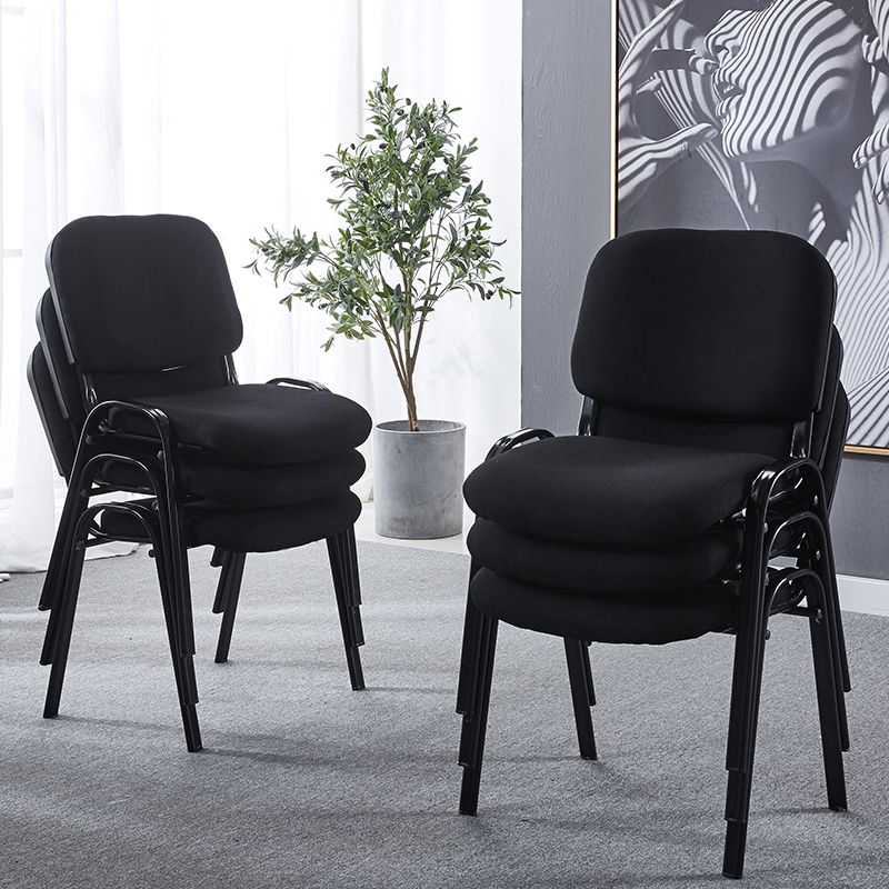 Stackable fabric office chair with ergonomic design and breathable upholstery for conference rooms and office spaces.