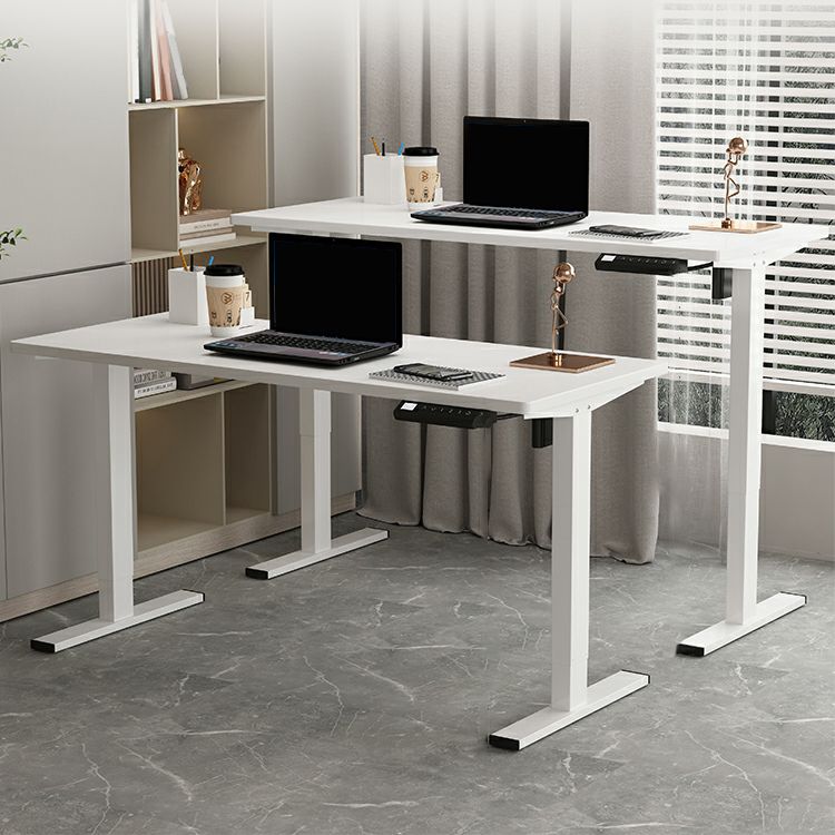 Electric standing adjustable office desk with motorized height control and ergonomic design.