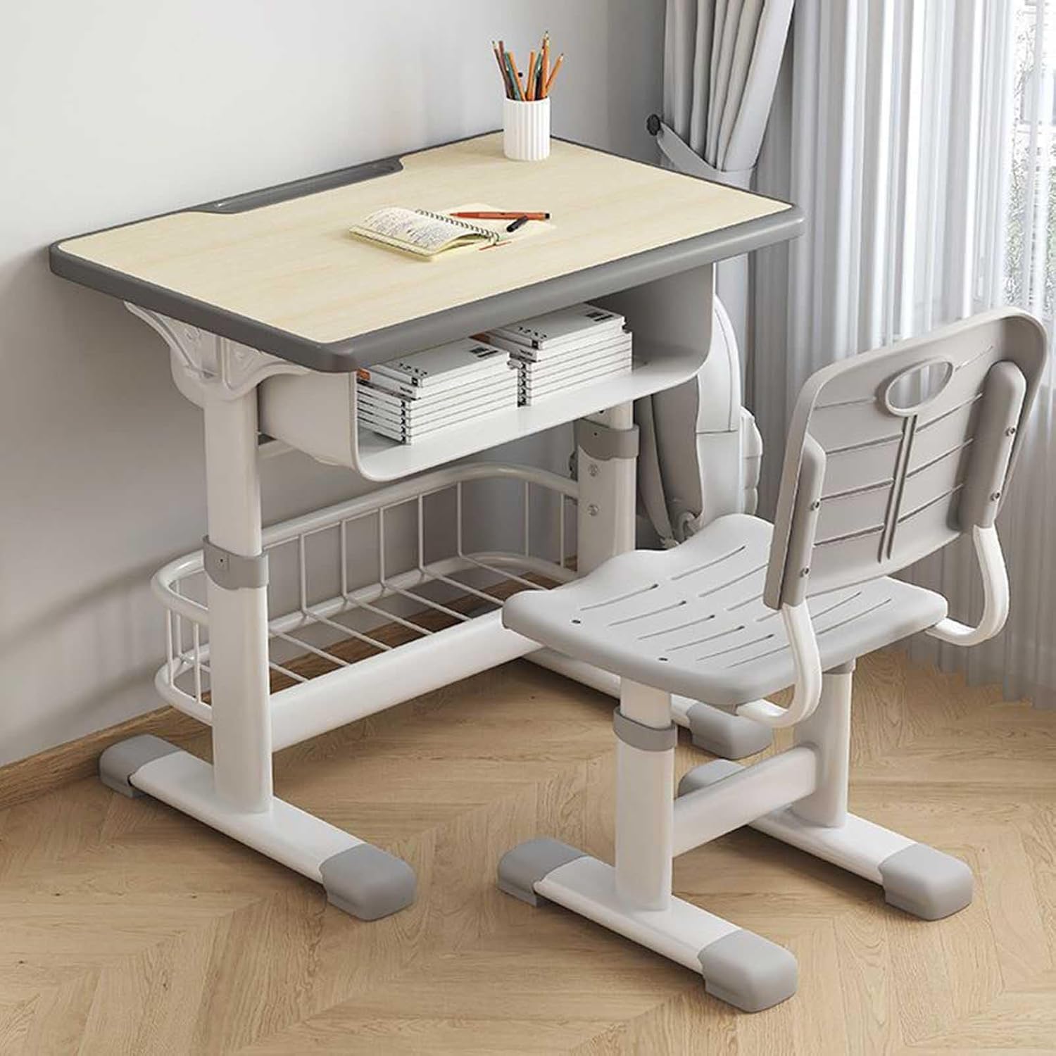 "Student desk and chair combo featuring adjustable height, ergonomic design, and built-in storage, perfect for a comfortable study environment."