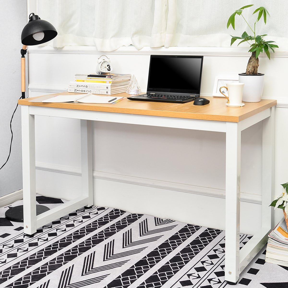 Simple computer study office desk with clean lines and built-in storage, designed for small spaces and efficient work.