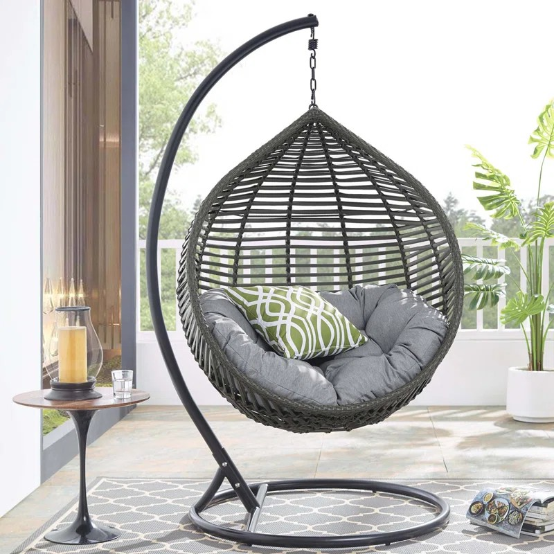 Hammock Swing Outdoor Home Chair with a breathable fabric seat, sturdy frame, and relaxing swinging motion for indoor and outdoor use.