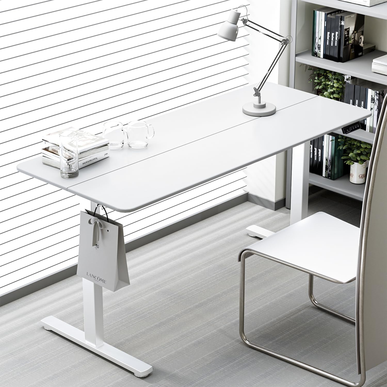 1400mm Office Sit-Stand Workstation with electric height adjustment, ergonomic design, and a spacious tabletop for a productive workspace.