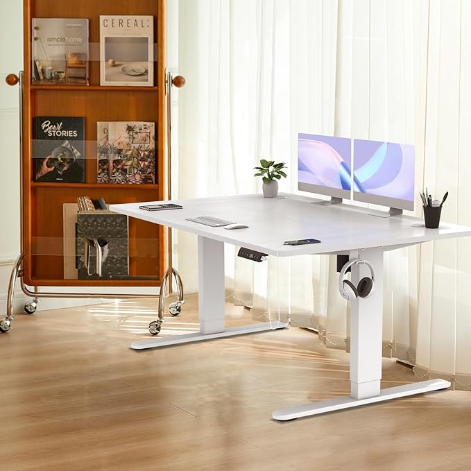 Electric standing desk with adjustable height for ergonomic workspace.