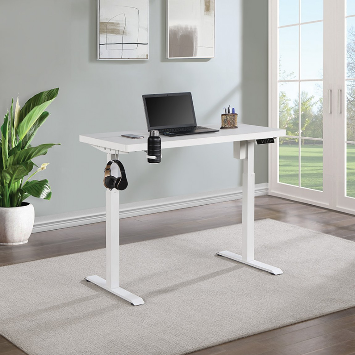 1.4 Meter Sit and Stand Height Desk with an electric adjustable mechanism, sturdy steel frame, and spacious wooden tabletop for ergonomic workspaces.