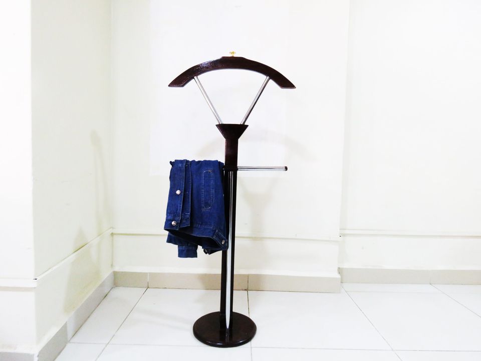 Elegant mahogany office coat hanger with a sturdy base and multiple hooks for coats, jackets, and accessories.