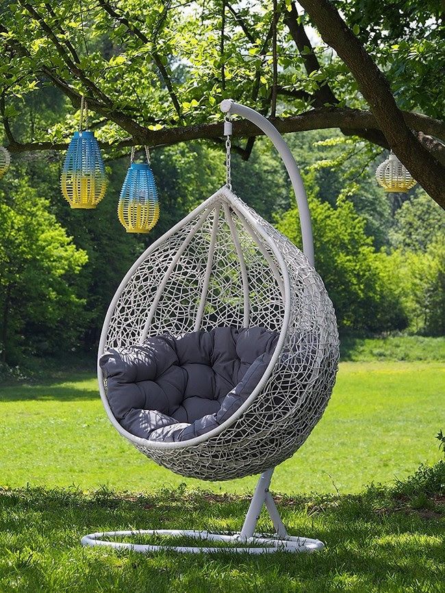 Outdoor Egg-Shaped Swing Chair with a stylish design, plush cushions, and a sturdy frame for ultimate comfort and relaxation.