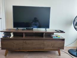 tv stand, modern tv stand, wooden tv stand, metal tv stand, glass tv stand, corner tv stand, floating tv stand, wall-mounted tv stand, tv console, tv cabinet, tv media console, entertainment center, low profile tv stand, large tv stand, small tv stand, narrow tv stand, wide tv stand, adjustable tv stand, swivel tv stand, rolling tv stand, mobile tv stand, tv stand with storage, tv stand with shelves, tv stand with drawers, tv stand with cabinets, tv stand with doors, open shelf tv stand, closed cabinet tv stand, minimalist tv stand, rustic tv stand, farmhouse tv stand, industrial tv stand, mid-century modern tv stand, Scandinavian tv stand, traditional tv stand, vintage tv stand, antique tv stand, sleek tv stand, glossy tv stand, matte finish tv stand, black tv stand, white tv stand, brown tv stand, oak tv stand, walnut tv stand, pine tv stand, mahogany tv stand, espresso tv stand, cherry tv stand, maple tv stand, reclaimed wood tv stand, eco-friendly tv stand, sustainable tv stand, handcrafted tv stand, custom tv stand, designer tv stand, luxury tv stand, budget tv stand, affordable tv stand, compact tv stand, space saving tv stand, entertainment furniture, media room furniture, living room tv stand, family room tv stand, bedroom tv stand, home theater furniture, gaming tv stand, smart tv stand, tv stand for 50 inch tv, tv stand for 55 inch tv, tv stand for 60 inch tv, tv stand for 65 inch tv, tv stand for 70 inch tv, tv stand for 75 inch tv, corner tv stand for large tv, tv stand with cable management, tv stand with hidden wiring, cable organizing tv stand, tv stand with usb ports, tv stand with power outlets, tv stand with led lighting, tv stand with glass doors, tv stand with metal legs, tv stand with wooden legs, tv stand with caster wheels, tv stand with adjustable shelves, tv stand with removable shelves, tv stand with open back, tv stand with closed back, tv stand with wall mount bracket, tv stand with built-in speakers, tv stand with fireplace, electric fireplace tv stand, modern farmhouse tv stand, coastal tv stand, beach style tv stand, cottage tv stand, loft style tv stand, urban tv stand, cabin style tv stand, mountain lodge tv stand, tv stand with stone accents, marble tv stand, granite tv stand, industrial metal and wood tv stand, rustic reclaimed wood tv stand, tv stand with wicker baskets, tv stand with fabric drawers, tv stand with leather accents, tv stand with stainless steel handles, tv stand with brass knobs, tv stand with vintage hardware, tv stand with sliding doors, tv stand with bifold doors, tv stand with barn doors, tv stand with mirror panels, tv stand with distressed finish, tv stand with painted finish, tv stand with natural wood finish, tv stand with lacquered finish, tv stand with veneer finish, tv stand with laminate finish, tv stand with eco-friendly paint, tv stand with non-toxic materials, tv stand with child-safe edges, tv stand with rounded corners, tv stand with soft-close doors, tv stand with soft-close drawers, tv stand with safety locks, tv stand with anti-tip straps, tv stand with hidden compartments, tv stand with pet-friendly materials, tv stand with scratch-resistant surface, tv stand with water-resistant finish, tv stand with heat-resistant finish, tv stand with easy assembly, tv stand with tool-free assembly, tv stand with instruction manual, tv stand with warranty, tv stand with customer support, tv stand with free shipping, tv stand with in-store pickup, tv stand with quick delivery, tv stand with same day shipping, tv stand with online exclusive, tv stand with discounted price, tv stand with clearance sale, tv stand with bundle offer, tv stand with financing option, tv stand with 5-star reviews, tv stand with top customer ratings, tv stand with editor’s pick, tv stand with award-winning design, tv stand with trending style, tv stand with minimalist design, tv stand with modern aesthetic, tv stand with classic look, tv stand with contemporary style, tv stand with industrial edge, tv stand with rustic charm, tv stand with vintage vibe, tv stand with eclectic design, tv stand with coastal feel, tv stand with boho style, tv stand with Scandinavian simplicity, tv stand with mid-century flair, tv stand with urban sophistication, tv stand with country farmhouse look, tv stand with cabin rustic look, tv stand with lodge style, tv stand with art deco design, tv stand with shabby chic look, tv stand with glam style, tv stand with luxury appeal, tv stand with affordable elegance, tv stand for smart home, tv stand for gaming setup, tv stand for streaming devices, tv stand for soundbars, tv stand for speakers, tv stand for consoles, tv stand for DVD players, tv stand for Blu-ray players, tv stand for cable boxes, tv stand for satellite receivers, tv stand for home office, tv stand for studio apartments, tv stand for condos, tv stand for dorm rooms, tv stand for small spaces, tv stand for large rooms, tv stand for open floor plan, tv stand for lofts, tv stand for basements, tv stand for family entertainment, tv stand for kids rooms, tv stand for teenagers, tv stand for adults, tv stand for seniors, tv stand for pet owners, tv stand for multi-use rooms, tv stand with versatile style, tv stand with timeless design, tv stand with functional storage, tv stand with decorative accents, tv stand with matching furniture, tv stand with coordinating decor, tv stand with complementary colors, tv stand with neutral colors, tv stand with bold colors, tv stand with pastel colors, tv stand with earth tones, tv stand with monochrome palette, tv stand with bright colors, tv stand with natural hues, tv stand with painted accents, tv stand with graphic design, tv stand with texture finish, tv stand with fabric panels, tv stand with woven details, tv stand with leather panels, tv stand with metal accents, tv stand with glass shelves, tv stand with wooden shelves, tv stand with open compartments, tv stand with hidden storage, tv stand with cable holes, tv stand with back panel, tv stand with adjustable feet, tv stand with anti-slip pads, tv stand with integrated lighting, tv stand with LED strips, tv stand with Bluetooth speakers, tv stand with wireless charging, tv stand with smart home compatibility, tv stand with Alexa integration, tv stand with Google Home integration, tv stand with Apple HomeKit compatibility, tv stand with eco-certifications, tv stand with FSC certification, tv stand with CARB compliance, tv stand with fire retardant materials, tv stand with BPA free materials, tv stand with anti-microbial coating, tv stand with UV resistant finish, tv stand with humidity resistant finish, tv stand with temperature resistant finish, tv stand with high durability, tv stand with long-lasting materials, tv stand with warranty coverage, tv stand with replacement parts, tv stand with customer service, tv stand with installation service, tv stand with assembly service, tv stand with DIY friendly design, tv stand with space optimization, tv stand with multi-level shelving, tv stand with integrated desk, tv stand with seating bench, tv stand with plant display area, tv stand with art display area, tv stand with kids friendly design, tv stand with pet friendly design, tv stand with modular components, tv stand with interchangeable parts, tv stand with upgrade options, tv stand with future proof design, tv stand with smart cable management, tv stand with hidden power strip, tv stand with wire clips, tv stand with velcro cable ties, tv stand with magnetic cable holders, tv stand with sleek profile, tv stand with decorative molding, tv stand with carved details, tv stand with minimalist hardware, tv stand with brushed metal handles, tv stand with polished knobs, tv stand with concealed hinges, tv stand with exposed hinges, tv stand with soft-close hinges, tv stand with industrial wheels, tv stand with locking casters, tv stand with fixed legs, tv stand with tapered legs, tv stand with mid-century legs, tv stand with chrome legs, tv stand with black metal legs, tv stand with wooden legs, tv stand with painted legs, tv stand with brass legs, tv stand with gold legs, tv stand with stainless steel legs, tv stand with aluminum legs, tv stand with plastic feet, tv stand with rubber feet, tv stand with felt pads, tv stand with floor protectors, tv stand with eco-friendly finishes, tv stand with zero VOC paint, tv stand with non-toxic glue, tv stand with formaldehyde-free wood, tv stand with renewable resources, tv stand with low carbon footprint, tv stand with recycled materials, tv stand with upcycled materials, tv stand with handcrafted details, tv stand with artisanal craftsmanship, tv stand with limited edition, tv stand with custom colors, tv stand with exclusive design, tv stand with made in USA, tv stand with imported materials, tv stand with international style, tv stand with global design influences, tv stand with coastal design, tv stand with mountain lodge design, tv stand with city chic design, tv stand with urban loft design, tv stand with family friendly design, tv stand with durable finish, tv stand with moisture resistant finish, tv stand with easy clean surface, tv stand with scratch resistant surface, tv stand with stain resistant surface, tv stand with heat resistant surface, tv stand with impact resistant surface, tv stand with fade resistant finish, tv stand with color fast finish, tv stand with UV protection, tv stand with anti-static coating, tv stand with anti-fingerprint coating, tv stand with anti-glare finish, tv stand with reflective surface, tv stand with matte surface, tv stand with satin finish, tv stand with pearl finish, tv stand with gloss finish, tv stand with semi-gloss finish, tv stand with texture finish, tv stand with embossed design, tv stand with inlay design, tv stand with decorative panels, tv stand with carved panels, tv stand with lattice panels, tv stand with slatted panels, tv stand with glass panels, tv stand with metal panels, tv stand with leather panels, tv stand with fabric panels, tv stand with reversible panels, tv stand with interchangeable panels, tv stand with DIY customization, tv stand with modular design, tv stand with expandable design, tv stand with collapsible design, tv stand with foldable design, tv stand with stackable design, tv stand with transportable design, tv stand with portable design, tv stand with travel friendly design, tv stand with lightweight design, tv stand with heavy-duty design, tv stand with commercial grade materials, tv stand with residential grade materials, tv stand with warranty included, tv stand with extended warranty, tv stand with product support, tv stand with installation guide, tv stand with video tutorial, tv stand with customer reviews, tv stand with Q&A, tv stand with FAQ, tv stand with product comparison, tv stand with buying guide, tv stand with style tips, tv stand with maintenance tips, tv stand with cleaning instructions, tv stand with safety tips, tv stand with eco-friendly packaging, tv stand with recyclable packaging, tv stand with carbon neutral shipping, tv stand with express shipping, tv stand with free returns, tv stand with money-back guarantee, tv stand with satisfaction guarantee, tv stand with trusted brand, tv stand with new arrival, tv stand with best seller, tv stand with top rated, tv stand with recommended, tv stand with award winning design.