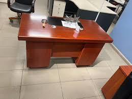 office desk, modern office desk, executive office desk, ergonomic office desk, wooden office desk, solid wood office desk, hardwood office desk, oak office desk, mahogany office desk, acacia office desk, engineered wood office desk, MDF office desk, particle board office desk, laminated office desk, veneer office desk, metal office desk, steel frame office desk, aluminum frame office desk, glass office desk, tempered glass office desk, transparent office desk, frosted glass desk, L-shaped office desk, U-shaped office desk, corner office desk, floating office desk, modular office desk, workstation desk, office workstation table, cubicle office desk, corporate office desk, home office desk, study office desk, writing office desk, computer office desk, laptop office desk, executive writing desk, compact office desk, small office desk, space saving office desk, large office desk, wide office desk, deep office desk, rectangular office desk, square office desk, curved office desk, wave office desk, straight office desk, office desk with drawers, office desk with lockable drawers, desk with pedestal, desk with double pedestal, desk with storage, office desk with shelves, office desk with cabinet, office desk with bookcase, office desk with hutches, office desk with overhead storage, office desk with modesty panel, office desk with privacy panel, office desk with keyboard tray, office desk with pull-out tray, office desk with CPU holder, office desk with cable management, office desk with grommets, office desk with wire organizer, office desk with USB ports, office desk with power outlets, office desk with LED lighting, standing office desk, electric height adjustable desk, manual height adjustable desk, sit-stand office desk, dual motor standing desk, single motor standing desk, crank adjustable desk, ergonomic standing desk, office desk with monitor stand, dual monitor desk, triple monitor desk, gaming office desk, professional gaming desk, curved gaming desk, LED gaming desk, workstation gaming desk, CEO office desk, manager office desk, director office desk, supervisor office desk, staff office desk, reception office desk, front office desk, secretary desk, typing desk, receptionist counter desk, luxury office desk, premium office desk, high-end office desk, contemporary office desk, minimalist office desk, Scandinavian office desk, industrial office desk, rustic office desk, farmhouse office desk, vintage office desk, retro office desk, classic office desk, traditional office desk, vintage wooden desk, luxury wooden desk, designer office desk, Italian office desk, German engineered office desk, imported office desk, Kenyan office desk, Nairobi office desk, office desk Kenya supplier, office desk Nairobi supplier, office desk Mombasa, office desk Kisumu, office desk wholesaler Kenya, office desk dealer Kenya, office desk retailer Kenya, office desk distributor Kenya, best office desk Kenya, trending office desk Kenya, office desk sale Kenya, office desk discounts Kenya, affordable office desk, budget office desk, cheap office desk, low cost office desk, durable office desk, heavy duty office desk, reinforced frame desk, strong office desk, stable office desk, wobble-free office desk, scratch resistant office desk, stain resistant desk, waterproof office desk, anti-rust office desk, UV resistant office desk, easy clean office desk, low maintenance office desk, anti-smudge desk surface, anti-fingerprint desk surface, eco friendly office desk, sustainable office desk, recyclable office desk, green office furniture desk, FSC certified wood desk, E1 grade board desk, non-toxic finish desk, hypoallergenic desk, space saving office furniture, office productivity desk, office workstation furniture, ergonomic workplace desk, adjustable ergonomic desk, office desk for co-working spaces, office desk for conference room, office desk for meeting room, office desk for reception area, office desk for lounge, office desk for boardroom, manager workstation desk, call center desk, open plan office desk, collaborative office desk, hot desking table, folding office desk, portable office desk, collapsible office desk, wall mounted office desk, fold-down office desk, floating wall desk, mobile office desk, wheeled office desk, rolling office desk, office desk with castors, office desk with wheels, office desk on casters, office desk with footrest, office desk with cup holder, office desk with headphone hook, office desk with storage baskets, office desk with file drawer, office desk with A4 drawer, office desk with letter drawer, office desk with lockable cabinet, office desk with hanging file rail, office desk with pen drawer, office desk with stationary organizer, office desk with partition, office desk with screen panel, office divider desk, benching workstation desk, multi-person office desk, 2 person workstation desk, 4 person workstation desk, 6 person workstation desk, 8 person workstation desk, shared office desk, cluster workstation desk, pod workstation desk, collaboration desk, conference workstation desk, 100cm office desk, 120cm office desk, 140cm office desk, 150cm office desk, 160cm office desk, 180cm office desk, 200cm office desk, 220cm office desk, oversize office desk, executive 2.0m office desk, executive 2.4m office desk, heavy-duty CEO desk, wide-leg office desk, T-leg office desk, Z-leg office desk, panel-leg office desk, loop-leg office desk, U-frame office desk, H-frame office desk, cantilever leg office desk, cable tray desk, office desk with cable channels, office desk with tiered shelves, office desk with open shelving, office desk with glass top, office desk with marble top, faux marble office desk, ceramic top desk, office desk with metal base, office desk with wooden top, office desk with PVC edge banding, office desk ABS edge, office desk with chamfered edges, office desk with rounded corners, office desk with beveled edge, ergonomic curved front desk, kidney shaped office desk, waterfall edge office desk, office desk for students, office desk for home study, office desk for small apartments, office desk for tiny spaces, corner-friendly office desk, right-hand return desk, left-hand return desk, reversible return desk, double sided office desk, reception workstation desk, hospitality office desk, hotel office desk, apartment office desk, dorm office desk, office desk for remote workers, WFH office desk, office desk online Kenya, office desk delivery Kenya, ready-made office desk, custom office desk, tailor made office desk, bespoke office desk, wood grain office desk, walnut finish office desk, teak finish office desk, wenge finish office desk, espresso brown office desk, dark brown office desk, light oak office desk, white office desk, black office desk, grey office desk, charcoal office desk, beige office desk, cream office desk, matte black desk, glossy white desk, high gloss office desk, textured surface office desk, linen finish desk, leather top office desk, fabric panel office desk, sound absorbing office desk, acoustic panel office desk, noise reducing office desk, office desk with modesty panel design, privacy-focused office desk, corporate executive desk, professional office desk, office desk for lawyers, office desk for doctors, office desk for teachers, office desk for accountants, office desk for designers, office desk for architects, drafting office desk, art studio office desk, multifunctional office desk, tech-friendly office desk, wire-free office desk, office desk with integrated power, office desk with charging station, smart office desk, app-controlled desk, AI-enabled office desk, digital height display desk, anti-collision standing desk, memory preset standing desk, productivity boosting desk, workplace wellness desk, office desk for productivity, efficient workspace desk, office desk for dual monitors, ultra wide desk, 2 meter executive desk, home workstation desk, multi-level office desk, tiered office desk, shelving desk, office desk with bulletin board, office desk with pin board, office desk with pegboard, workstation with sliding doors, workstation with open cubbies, workstation with drawers and shelves, office desk with drawer organizer, office desk with metal drawer, steel office desk, fire-resistant office desk, heat-resistant office desk, scratch-proof office desk, impact resistant office desk, anti-slip office desk, balanced frame desk, reinforced desktop desk, heavy top office desk, anti-tilt office desk, engineered frame office desk, adjustable feet office desk, leveling feet office desk, anti-vibration office desk, library office desk, training room office desk, classroom office desk, seminar desk, IT workstation desk, command center desk, office desk for servers, cable intensive office desk, workstation tower desk, office desk with privacy wings, office desk with side storage, office desk with display shelf, office desk with printer shelf, office desk with CPU compartment, office desk with open cabinet, 3 drawer office desk, 4 drawer office desk, 5 drawer office desk, executive desk with side return, L-shaped workstation with pedestal, U-shaped workstation with hutch, adjustable corner desk, oversized executive desk, workspace optimization desk, office furnishing desk, office setup desk, office furniture Kenya, best office desk designs, durable modern desk, stylish office workstation, premium commercial desk, corporate workstation furniture, office desk for startups, office desk for SMEs, executive suite desk, office suite desk, professional workstation table, boardroom side desk, meeting room writing desk, hot desk workstation, office desk with lock, office desk with safe, office desk with anti-theft features, office desk for confidential work, paperwork office desk, file management desk, desk for productivity zones, dual purpose office desk, hobby desk, craft office desk, business desk, entrepreneur desk, management desk, director suite desk, luxury CEO furniture, premium boardroom desk companion, workstation desk Kenya, office setup Kenya, modern desk Nairobi, contemporary desk Kenya, trending office furniture Kenya, office desk new arrival, office desk top seller Kenya, bestselling office desk, ergonomic desk Kenya, office desk online store Kenya.